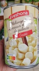 Mélange de morceaux et cœurs de palmier coupés