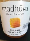 Madhāva organic creamed honey